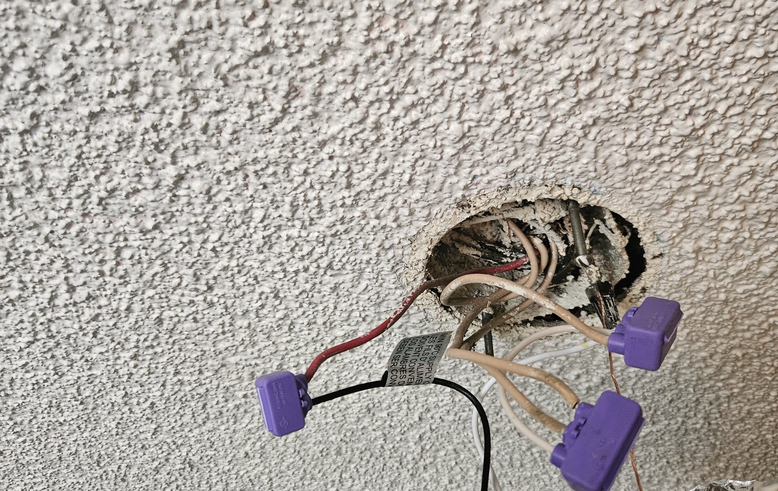 wiring sticking out of light outlet