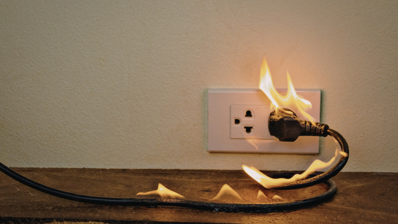 Outlet plugged in on fire